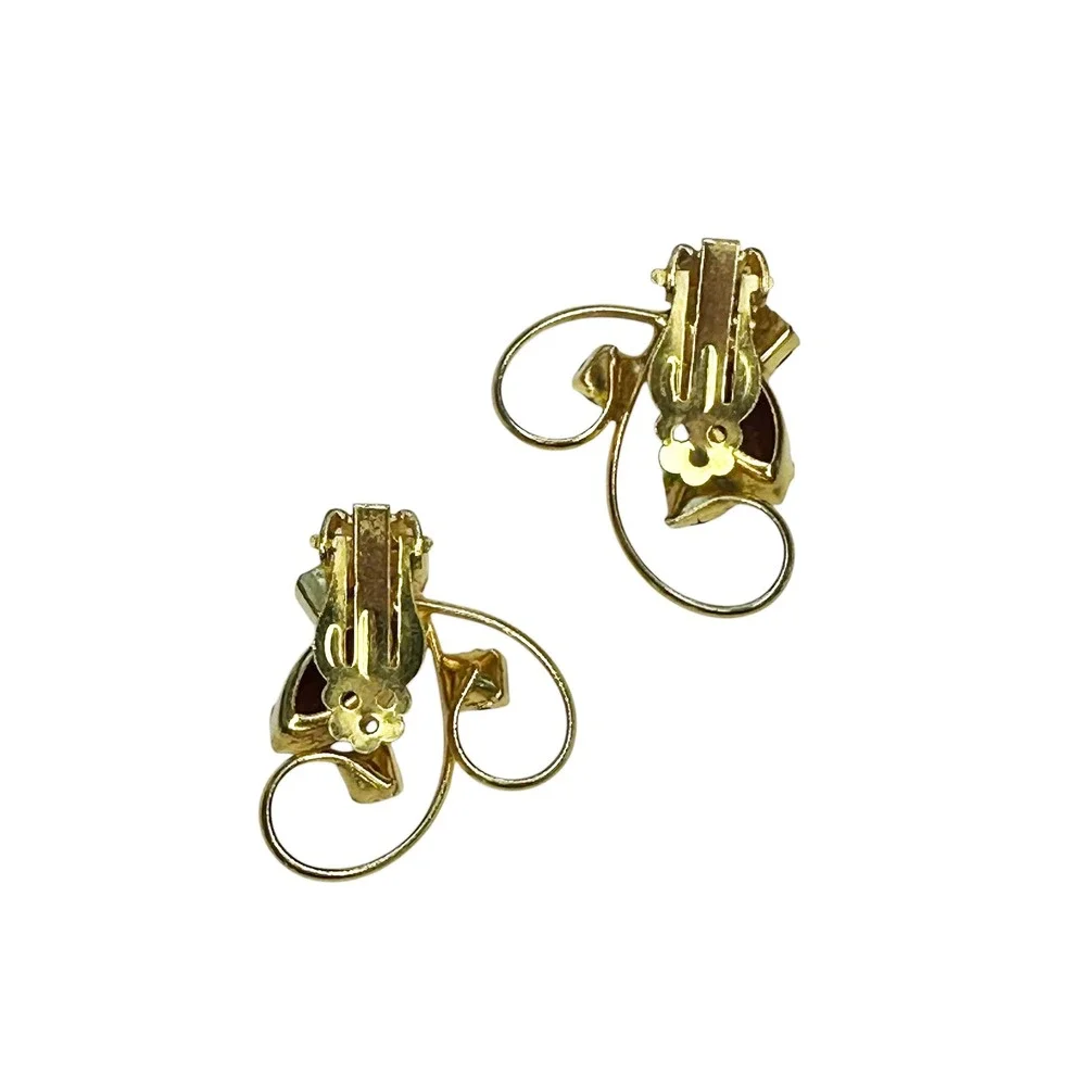 VINTAGE Mid-Century Floral Swirl Motif Clip-on Earrings • amber, gray, gold tone